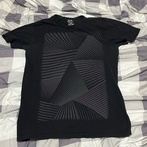 Oakley T-shirt. Used. Light fading. Still in good condition.
